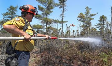 La pluie aide à maîtriser les incendies dans l'Est canadien