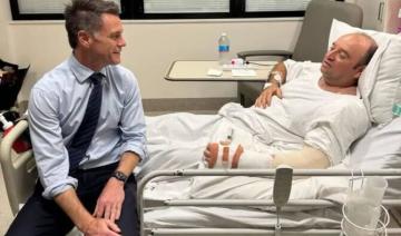 Attentat de Sydney: le Premier ministre australien rend visite au «héros» de la plage de Bondi