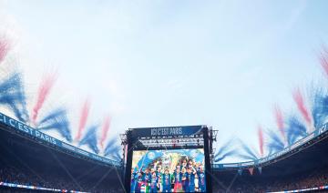 Ligue des champions: le PSG entre dans la légende, liesse et tensions à Paris
