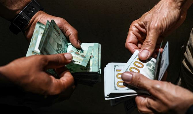 La monnaie nationale, fixée officiellement depuis 1997 au taux de 1 507 livres pour un dollar, a perdu depuis 2019 environ 95% de sa valeur. (Photo, AFP)