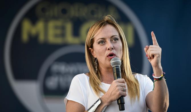 La dirigeante d'extrême droite Giorgia Meloni, s'adresse à ses partisans lors d'un rassemblement dans le cadre de la campagne pour les élections générales, sur la Piazza Duomo à Milan, en Italie, le 11 septembre 2022. (Photo, AFP)
